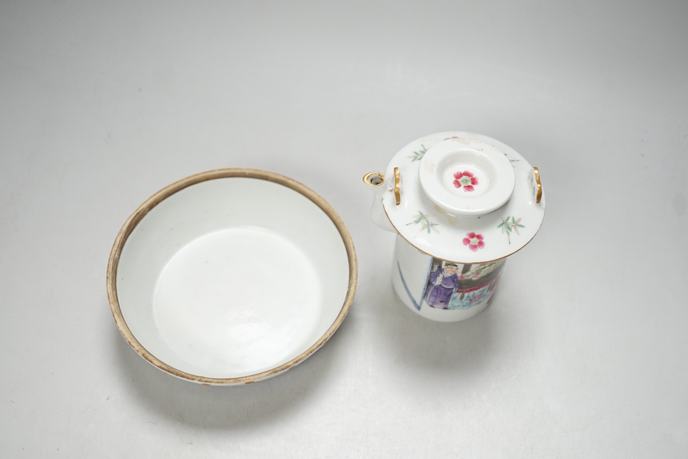 A Chinese famille rose teapot and a cover, together with a similar dish. 12cm tall